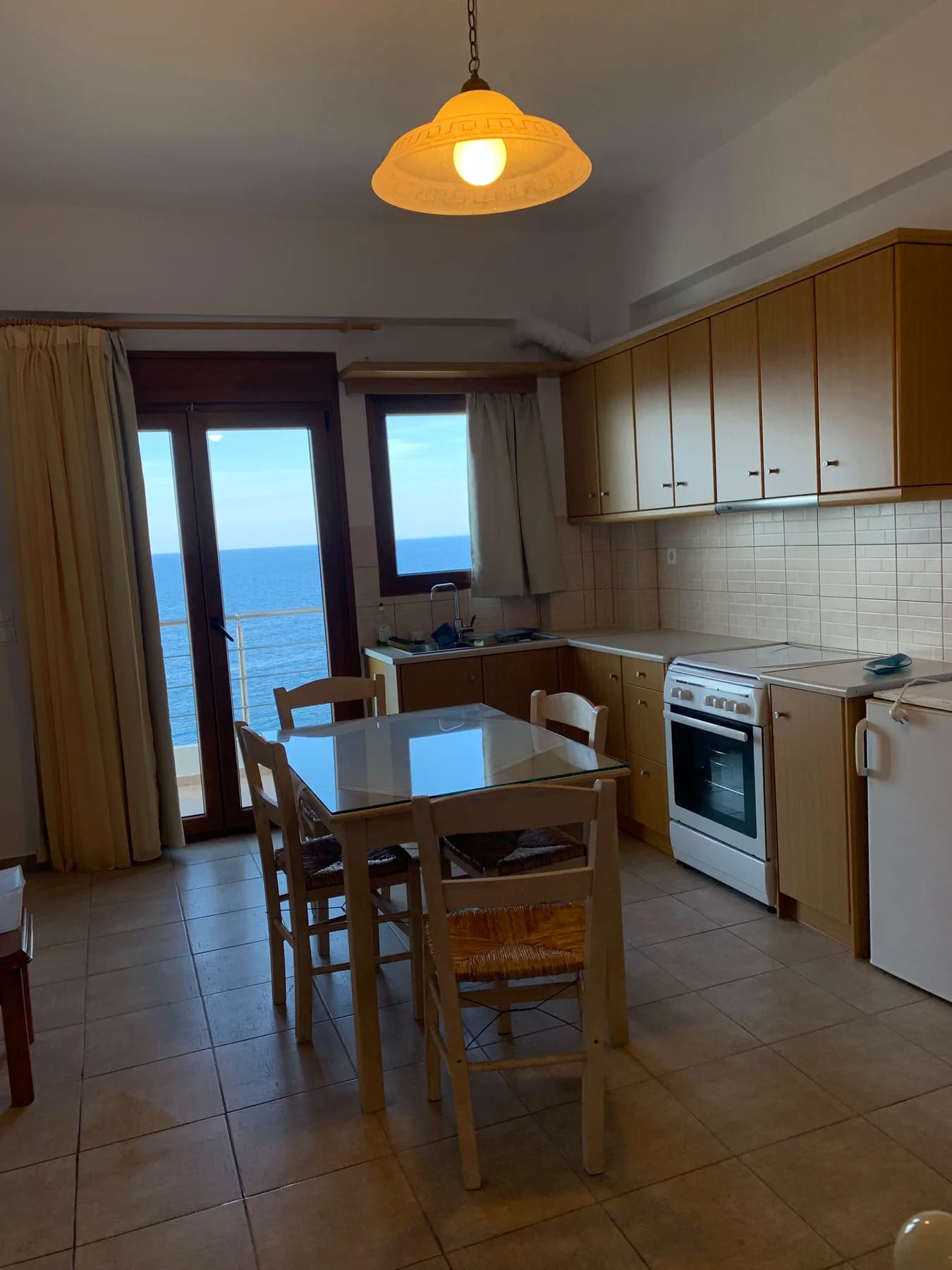 Kitchen and dining area inside a Kochili apartment
